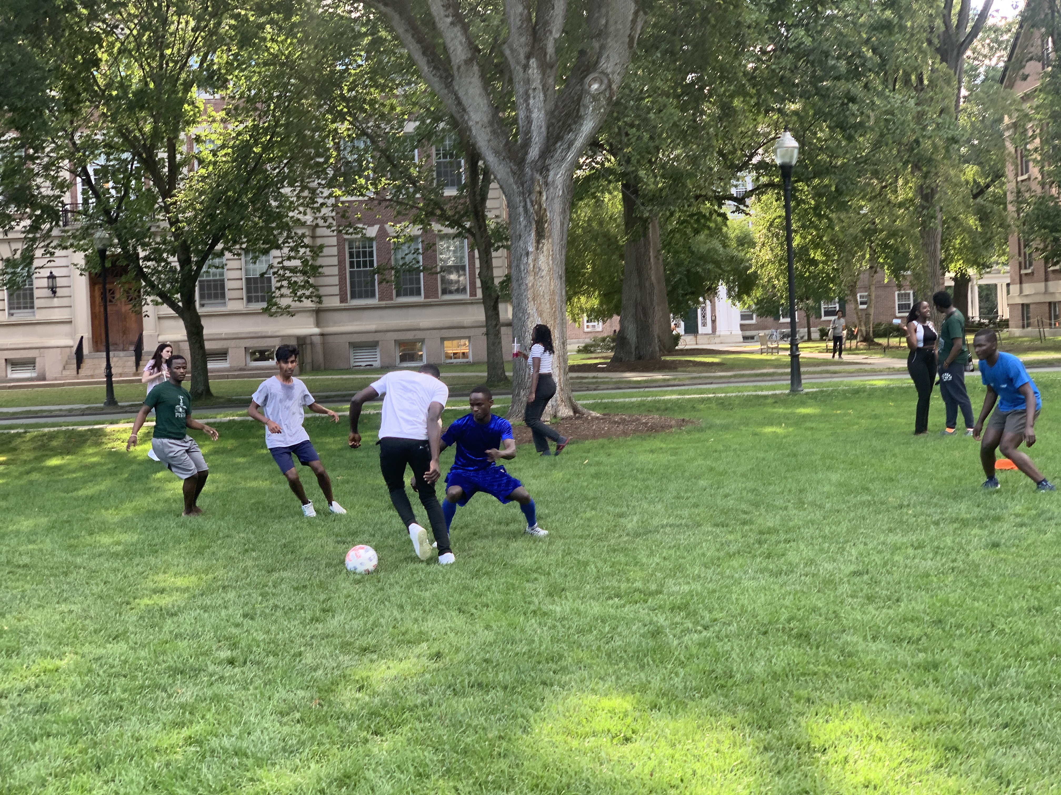 People playing pick up soccer on the Dartmouth green