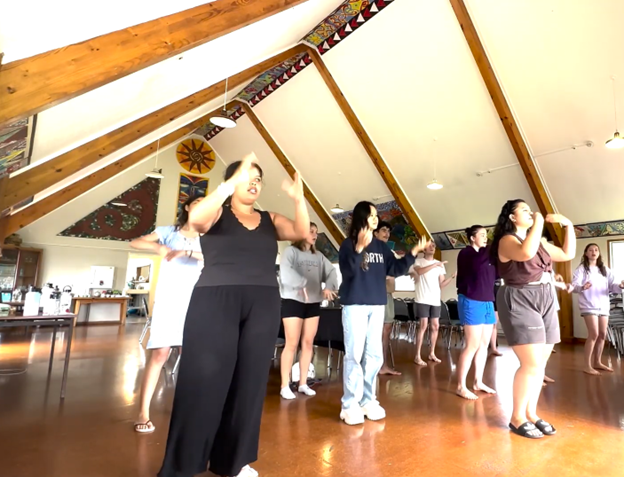 Students learning Maori dance.